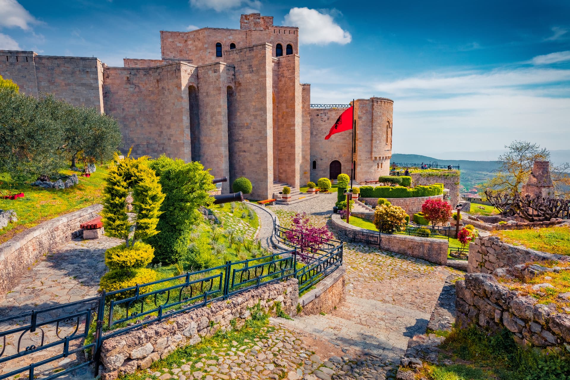 Traveller overlooking a bay in Albania